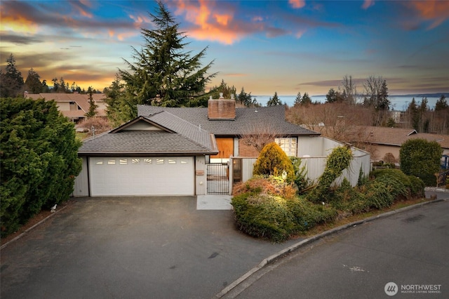 view of front of house with a garage