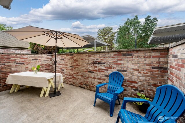 220 SW 200th St Unit 186, Normandy Park, WA 98166 - view of patio featuring outdoor dining area