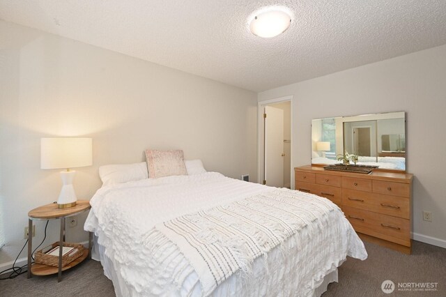 220 SW 200th St Unit 186, Normandy Park, WA 98166 - bedroom featuring carpet floors and a textured ceiling