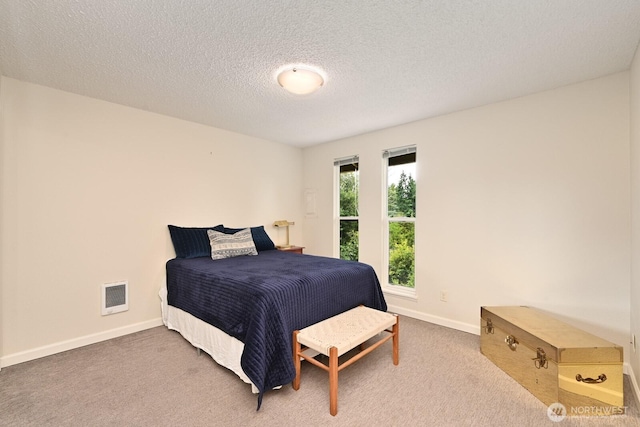 220 SW 200th St Unit 186, Normandy Park, WA 98166 - bedroom with carpet floors and a textured ceiling