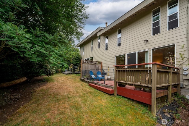 220 SW 200th St Unit 186, Normandy Park, WA 98166 - view of green lawn with a wooden deck