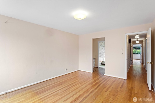 unfurnished room featuring light wood-type flooring