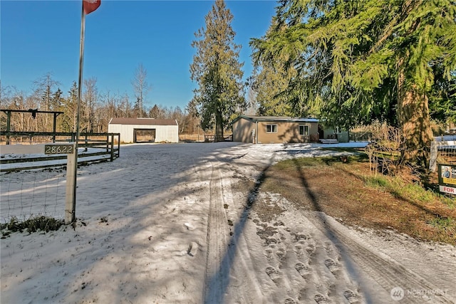 exterior space with an outbuilding