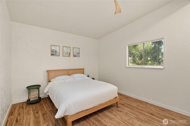 1508 Hoquiam Ln S, Westport, WA 98595 - bedroom with vaulted ceiling and hardwood / wood-style floors