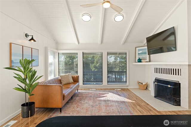1508 Hoquiam Ln S, Westport, WA 98595 - living room with vaulted ceiling with beams and ceiling fan