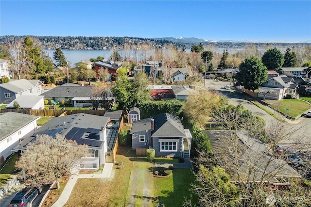 aerial view with a residential view and a water view