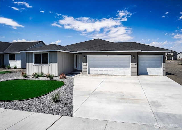 ranch-style house featuring a garage and a front yard