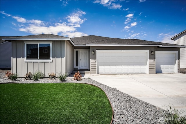 ranch-style home featuring a garage and a front yard