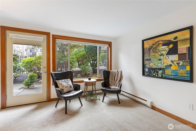 living area featuring carpet floors and a baseboard radiator