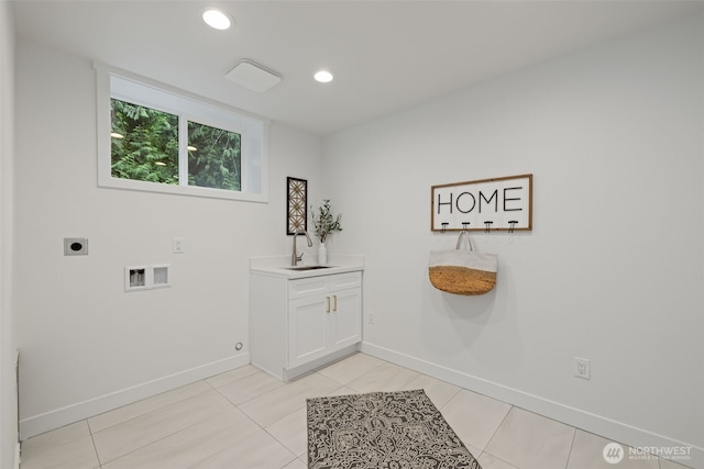 laundry room featuring washer hookup, sink, light tile patterned flooring, cabinets, and hookup for an electric dryer