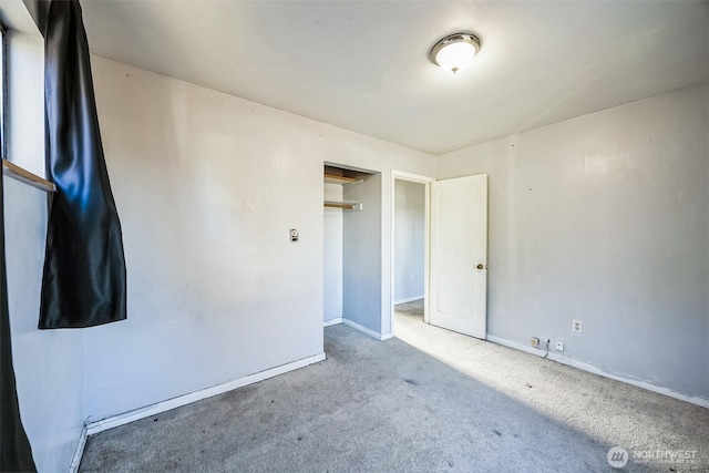 unfurnished bedroom featuring carpet