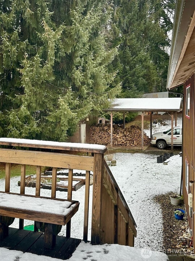 view of snow covered deck