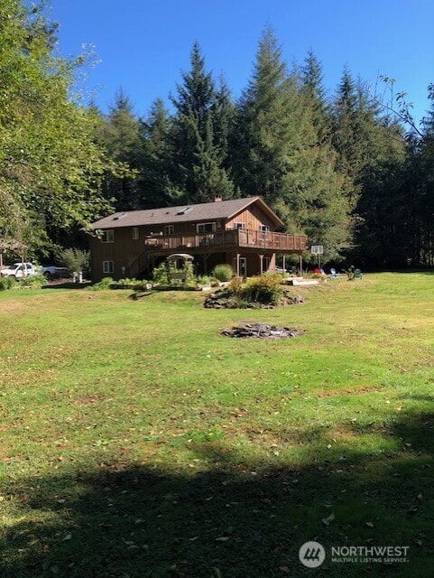 view of yard with a deck