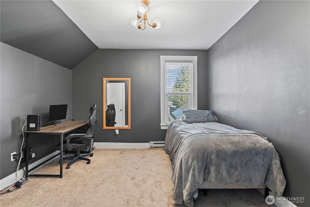 carpeted bedroom with baseboard heating and vaulted ceiling