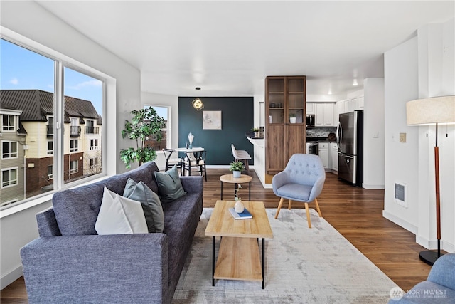 living room featuring dark hardwood / wood-style flooring