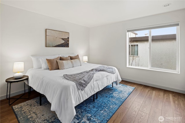 bedroom featuring hardwood / wood-style floors