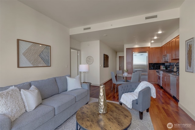 living room with wood-type flooring