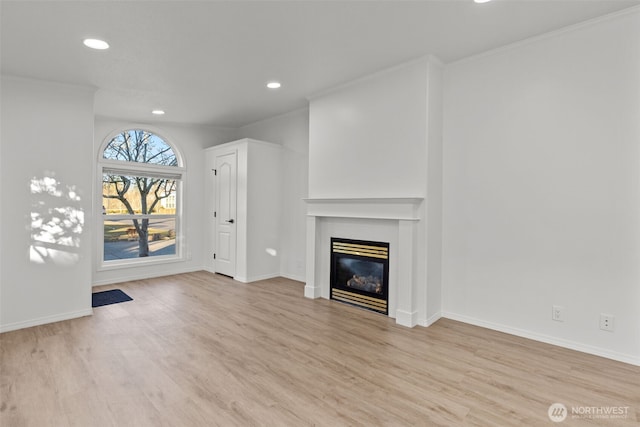 unfurnished living room with light wood-type flooring