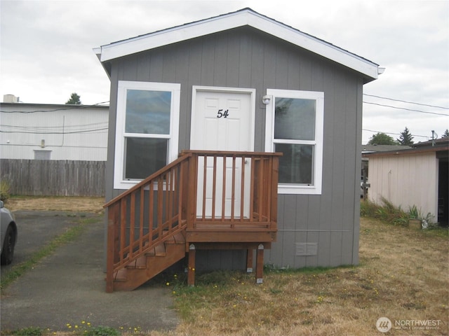 exterior space with a front yard