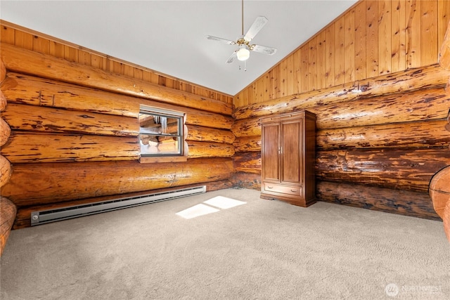 empty room with high vaulted ceiling, a baseboard heating unit, carpet, and a ceiling fan