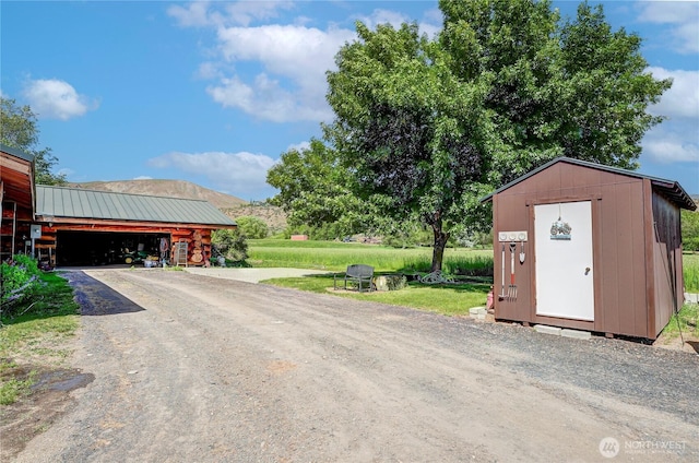 view of street featuring driveway