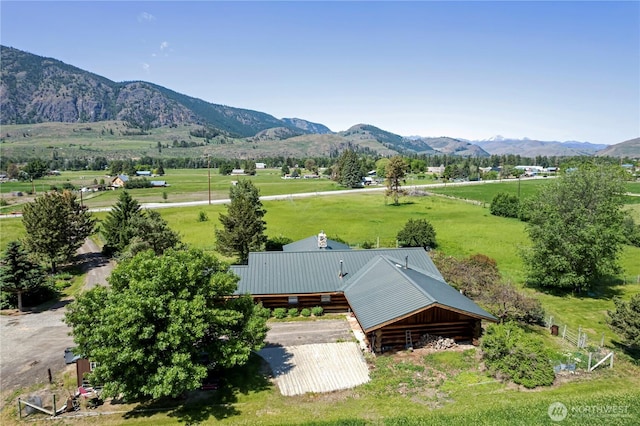 drone / aerial view featuring a mountain view and a rural view