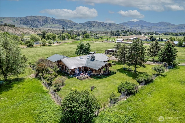 drone / aerial view featuring a rural view and a mountain view