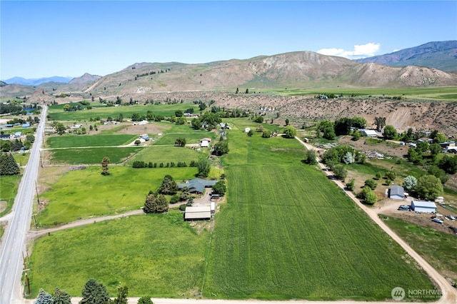 drone / aerial view with a rural view and a mountain view