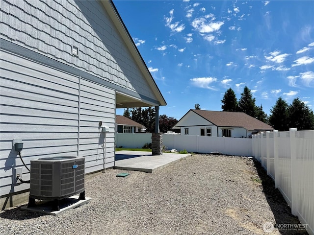 2764 N Breckenridge Dr, East Wenatchee, WA 98802 - fenced backyard with central AC unit and a patio