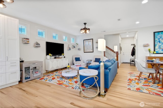 living room with light hardwood / wood-style floors