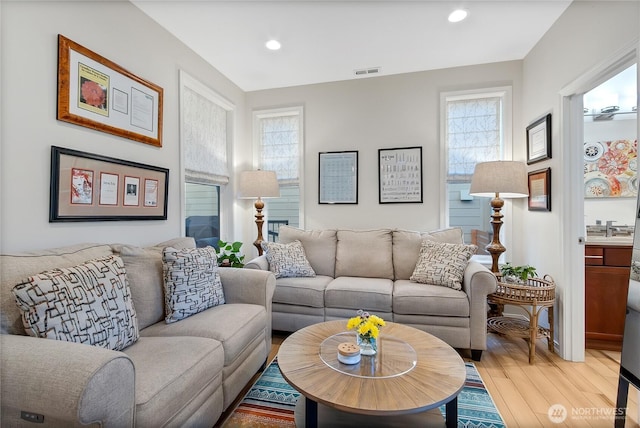 living room with hardwood / wood-style floors