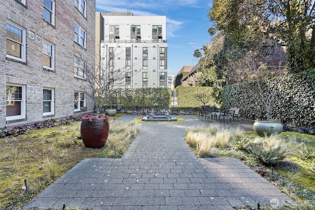 view of property's community featuring a patio area