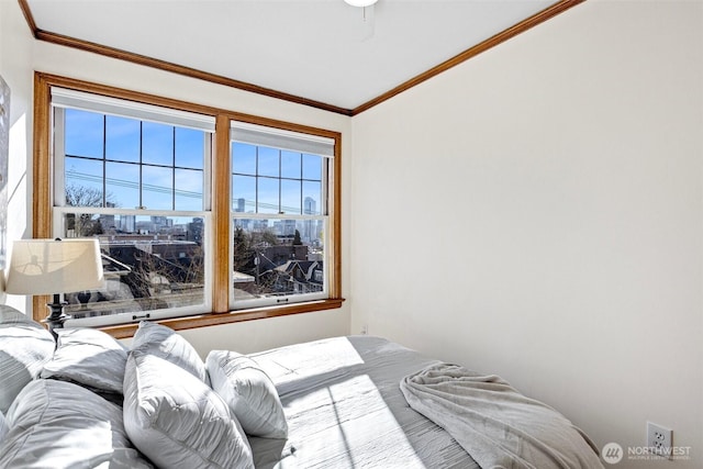 bedroom featuring crown molding