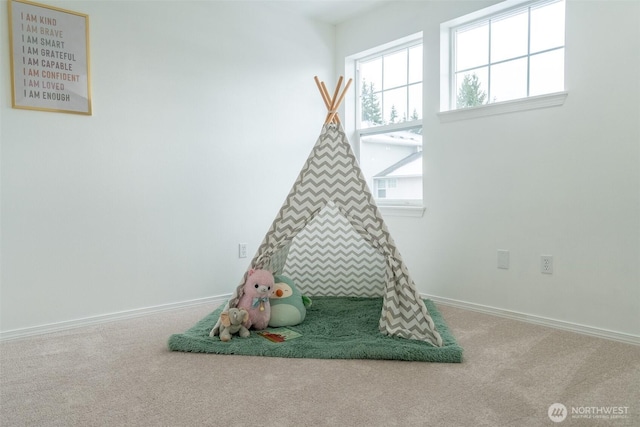 recreation room featuring carpet floors