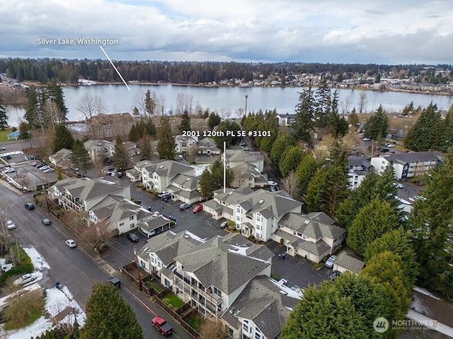 bird's eye view with a water view