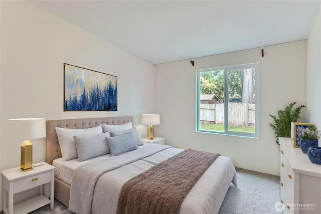 bedroom with light carpet