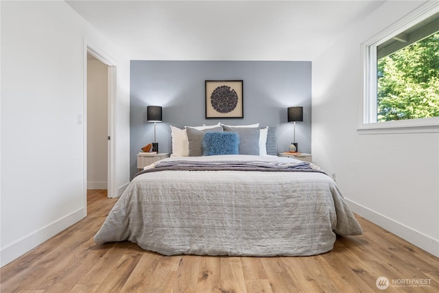 bedroom featuring hardwood / wood-style floors