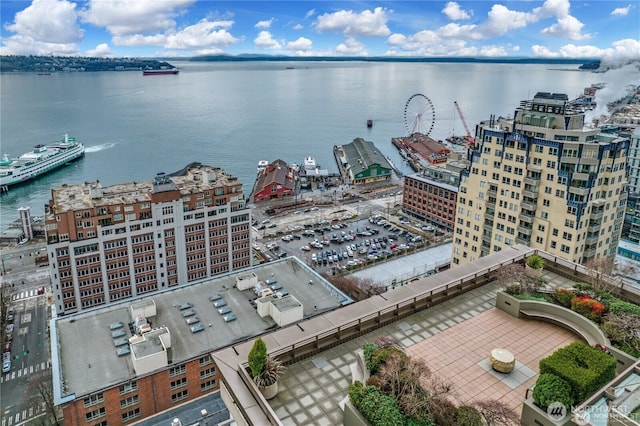 birds eye view of property featuring a water view