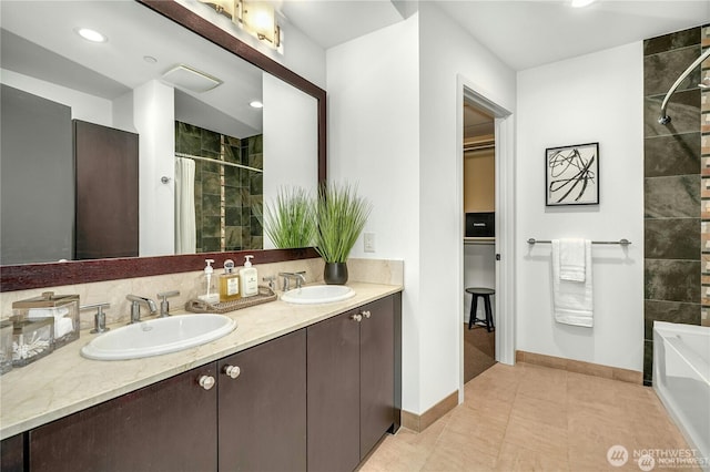 bathroom with tile patterned floors, vanity, and independent shower and bath