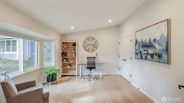 office area featuring vaulted ceiling, recessed lighting, light wood-style floors, and baseboards