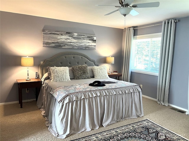 bedroom featuring carpet floors, visible vents, ceiling fan, and baseboards