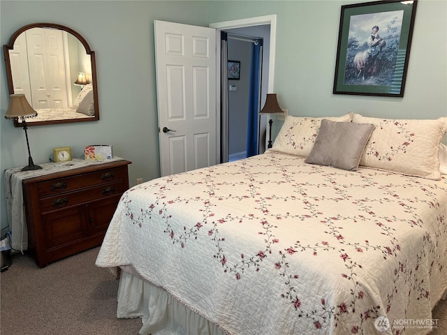 bedroom featuring carpet