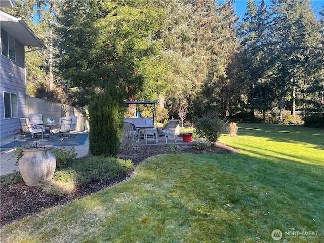 view of yard featuring a patio area and fence