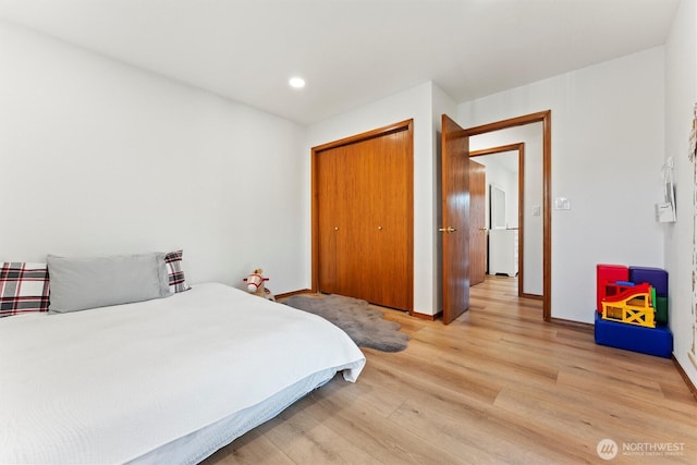 9447 Vernal Ave SE, Moses Lake, WA 98837 - bedroom with a closet and light wood-type flooring