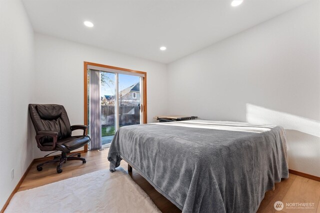 9447 Vernal Ave SE, Moses Lake, WA 98837 - bedroom featuring access to outside and light wood-type flooring