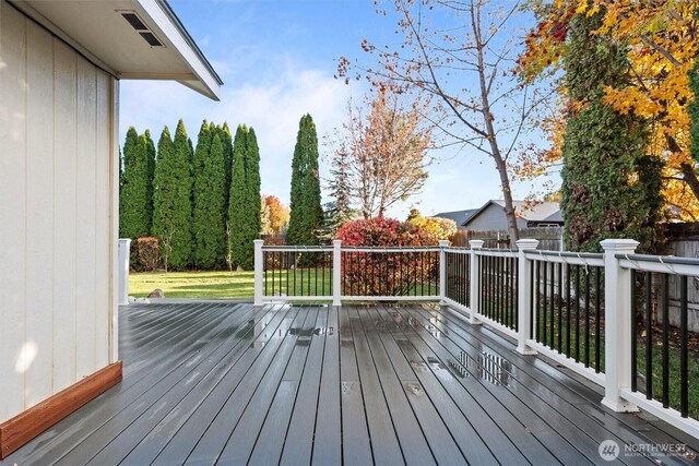 9447 Vernal Ave SE, Moses Lake, WA 98837 - wooden terrace featuring a lawn