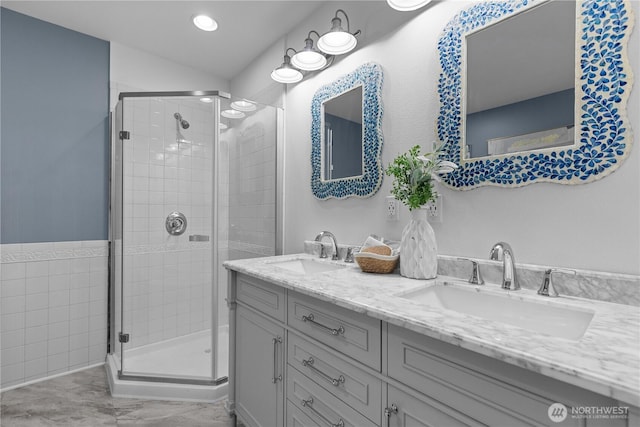 bathroom with vanity and walk in shower