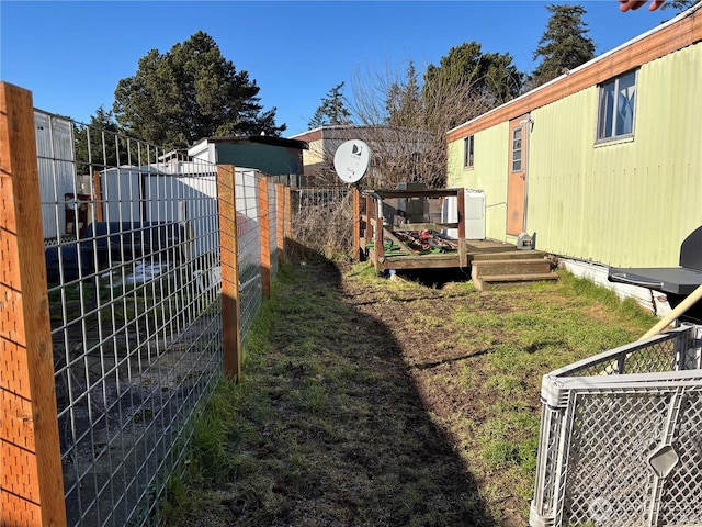 view of yard featuring central AC