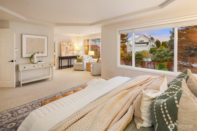 bedroom featuring light carpet