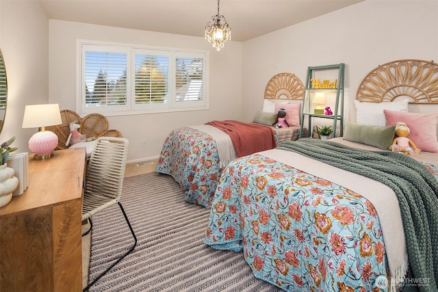 bedroom featuring a chandelier